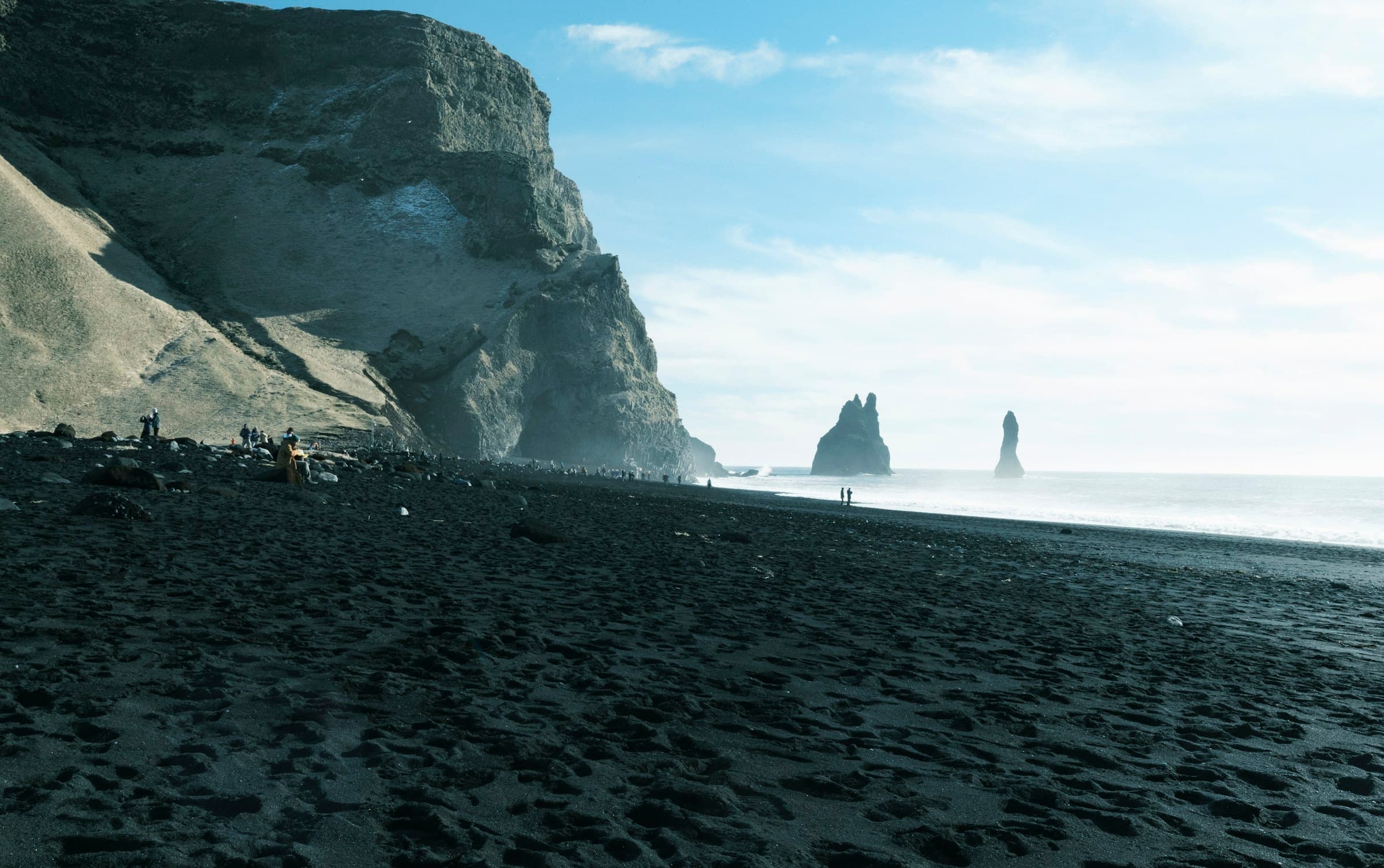 Black-sand beach and basalt sea stacks at Reynisfjara near Vík, Iceland